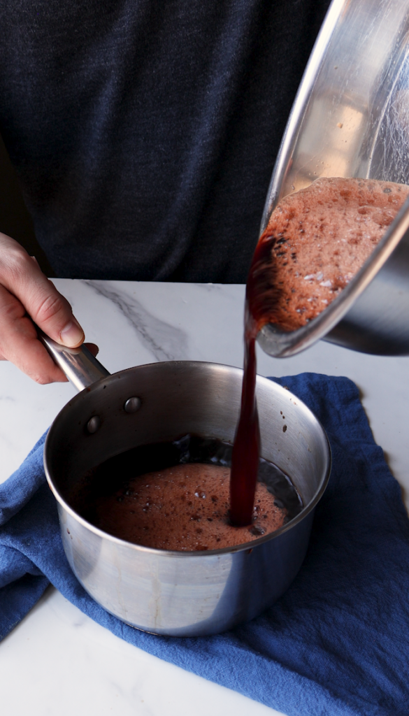 go back and forth between bowls to cool down the tea after it's done boiling